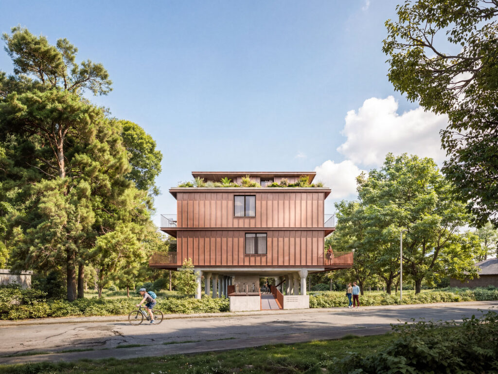 The Canopy vanuit de straat met kopergevel op palen